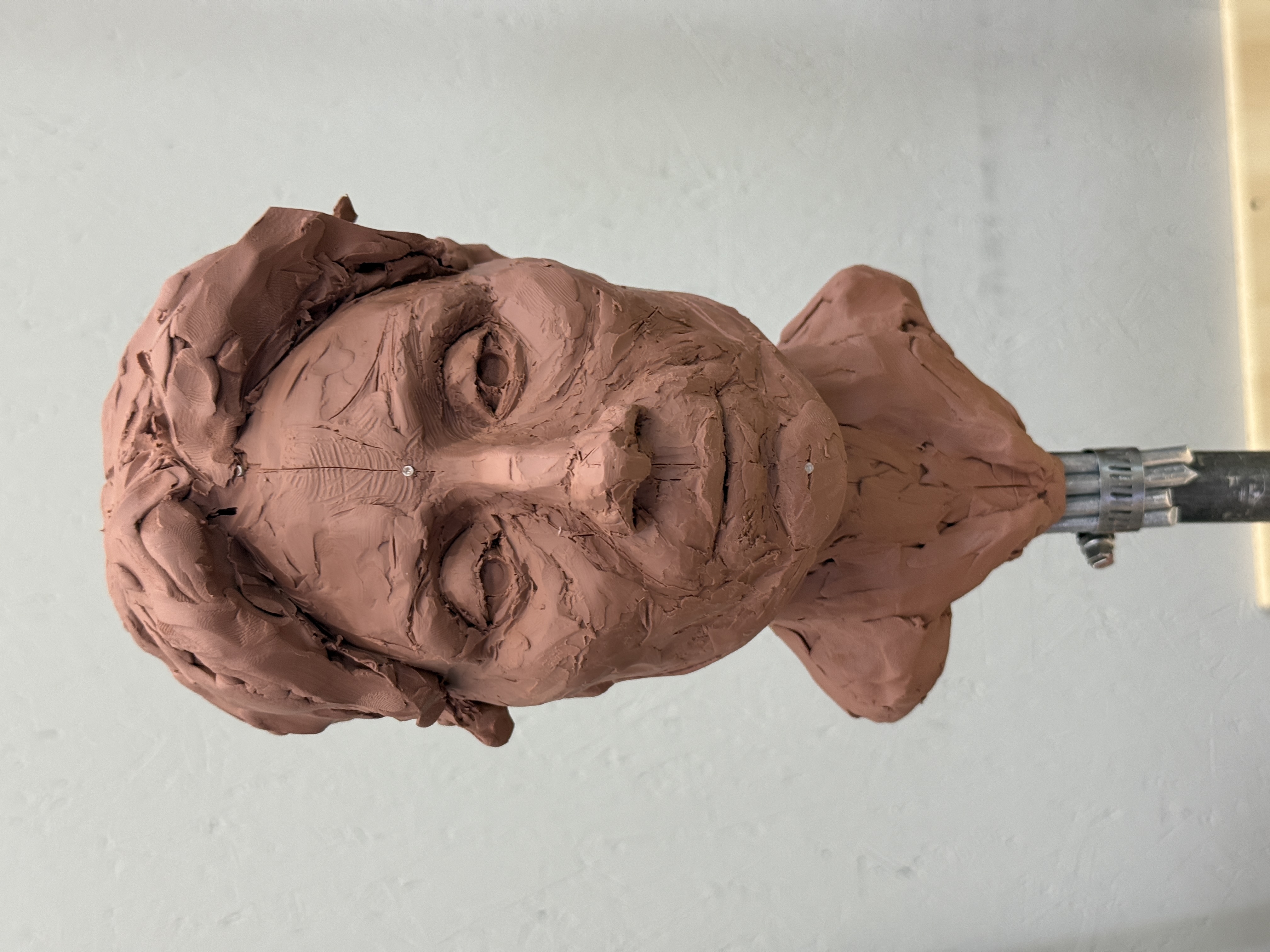 Portrait sculpture process side view